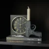 Vakkenkast decoratie set klok met Chanel tafelboek en pistool kandelaar