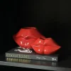 Vakkenkast decoratie set met twee lip vazen en Chanel tafelboek